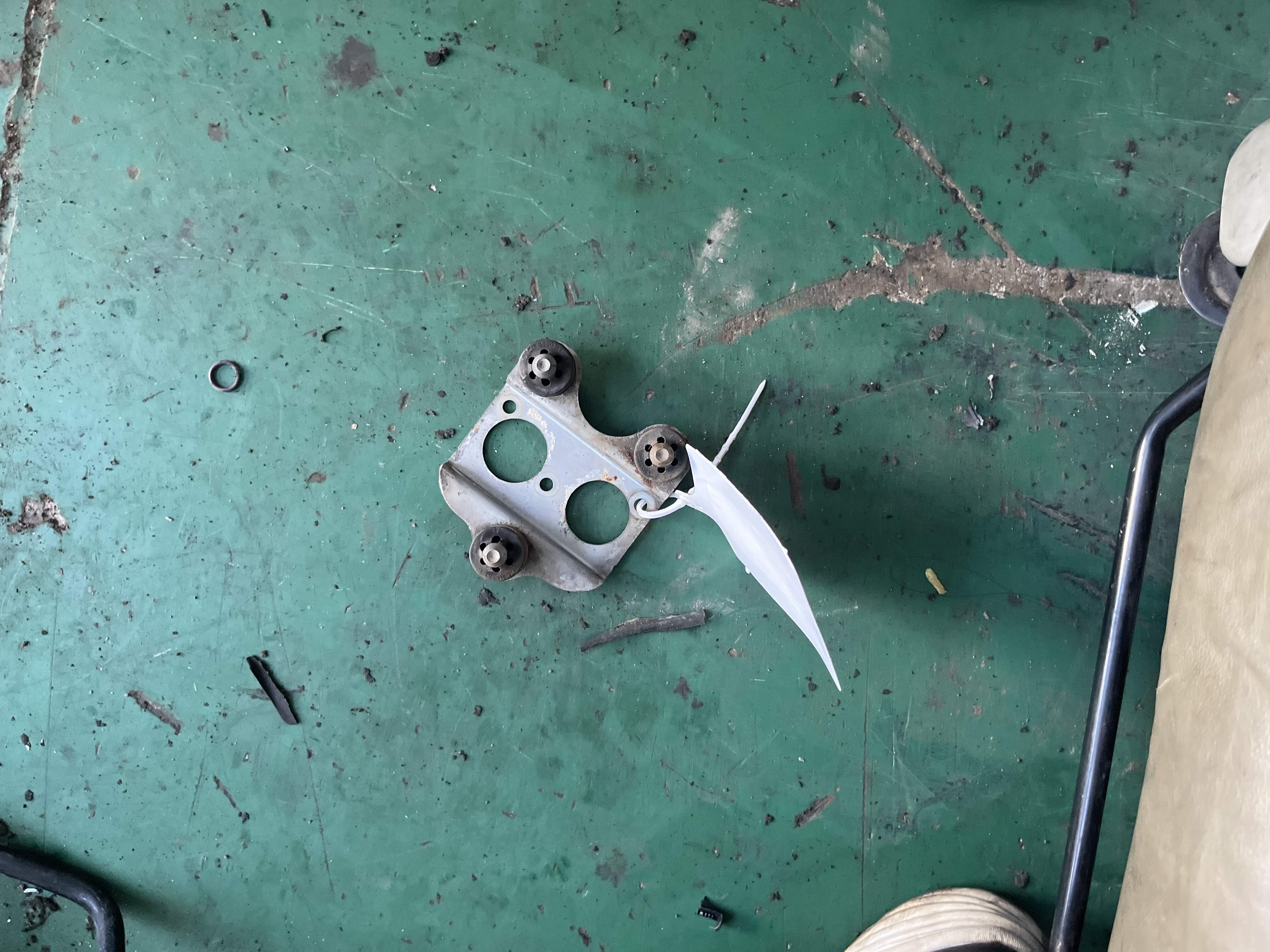7L8614235 ABS Pump Bracket, Upper