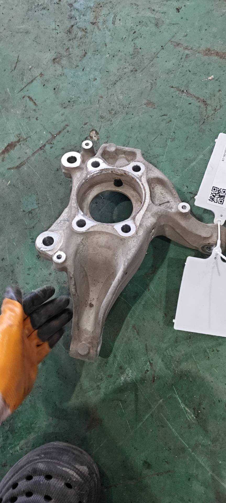 F2GC3K170AC Front Steering Knuckle, Right