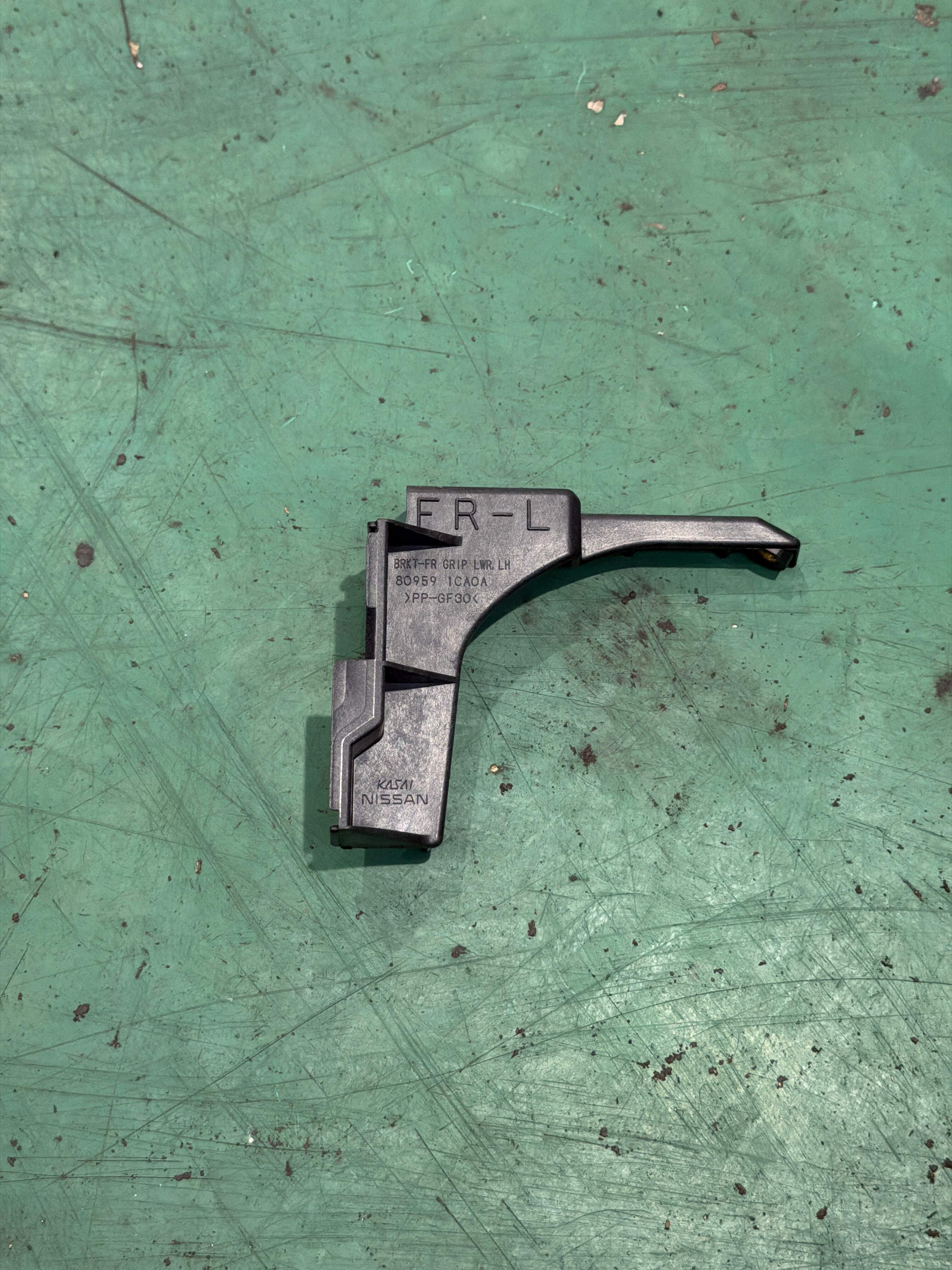 809591CA0A Front Door Armrest Bracket, Left