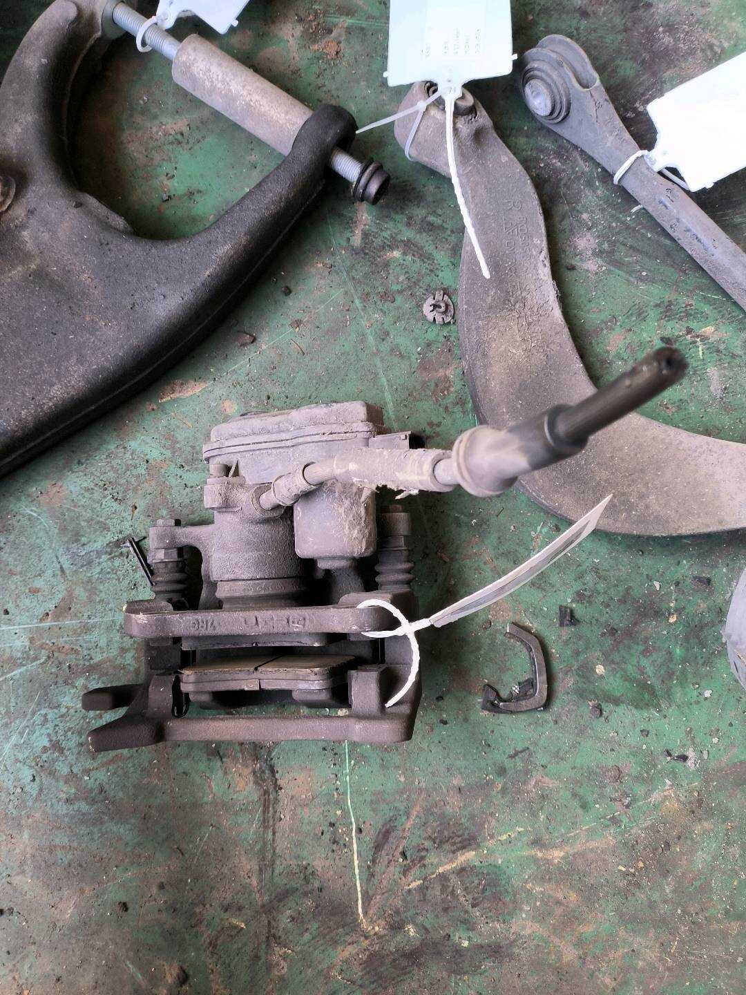 L4GD615404 Rear Brake Caliper, Right
