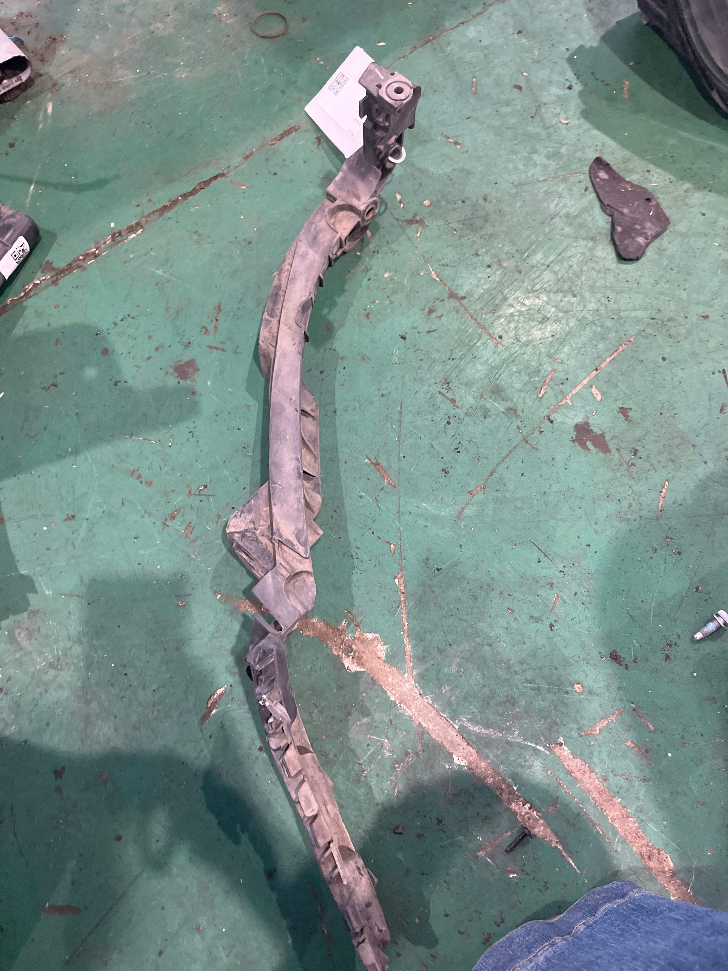 1K9807571D Front Headlight Bracket, Left