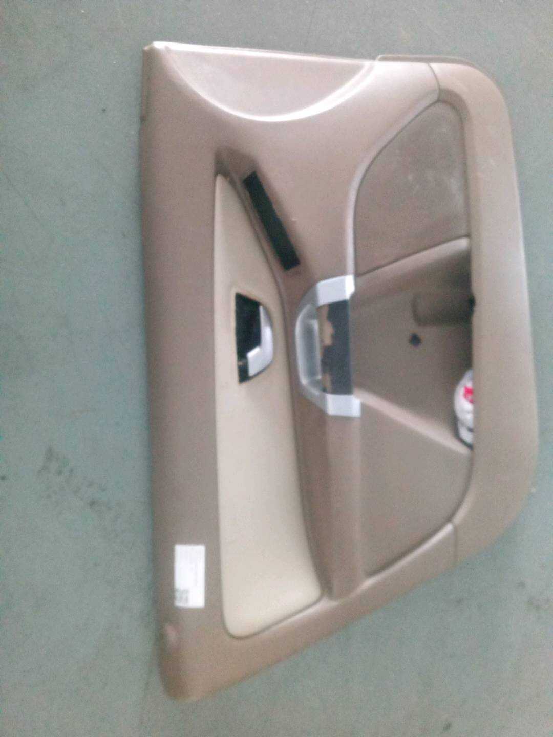 39885536 Front Door Trim Panel, Left