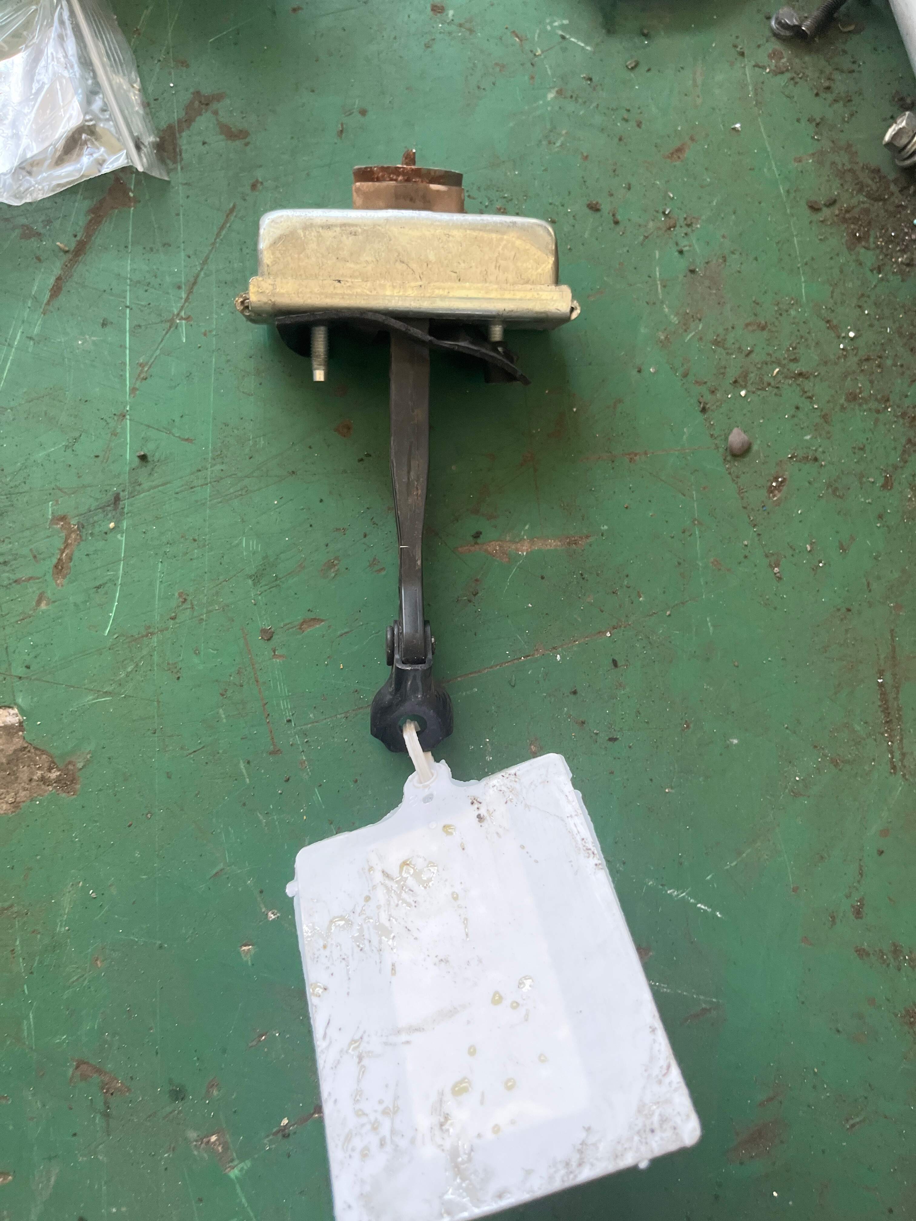 LR042383 Rear Door Check Strap, Left