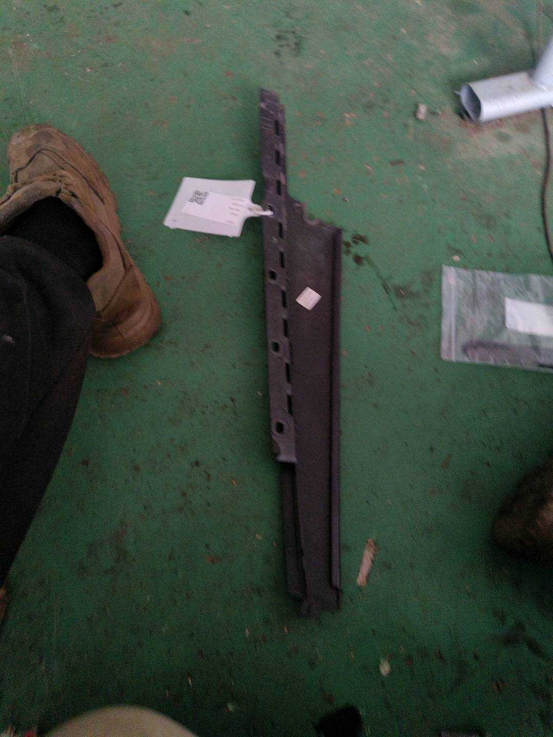 T4A1220 Rear Door Window Frame Outer Trim, Front Left