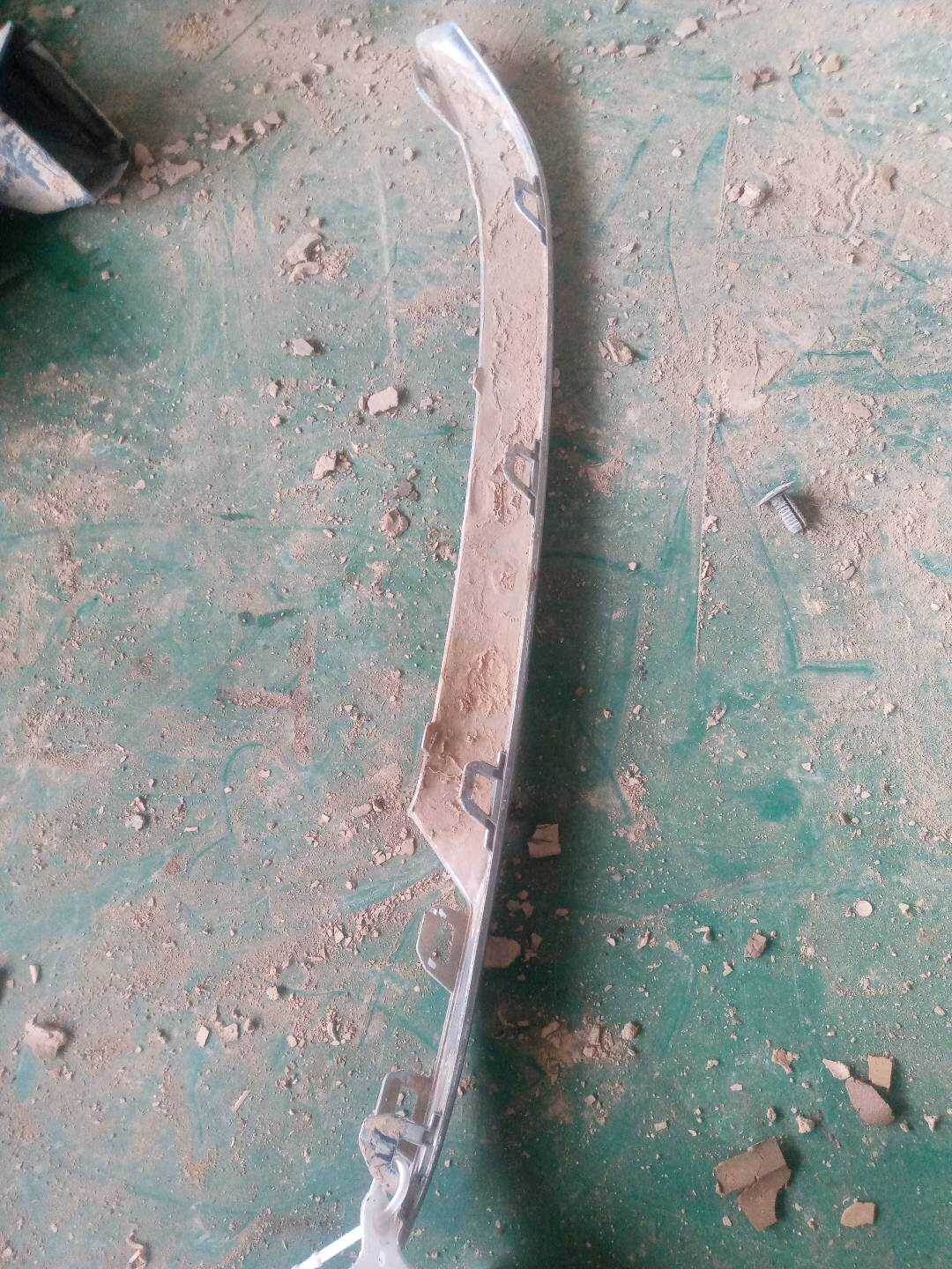 51117415601 Front Bumper Grille Molding, Left