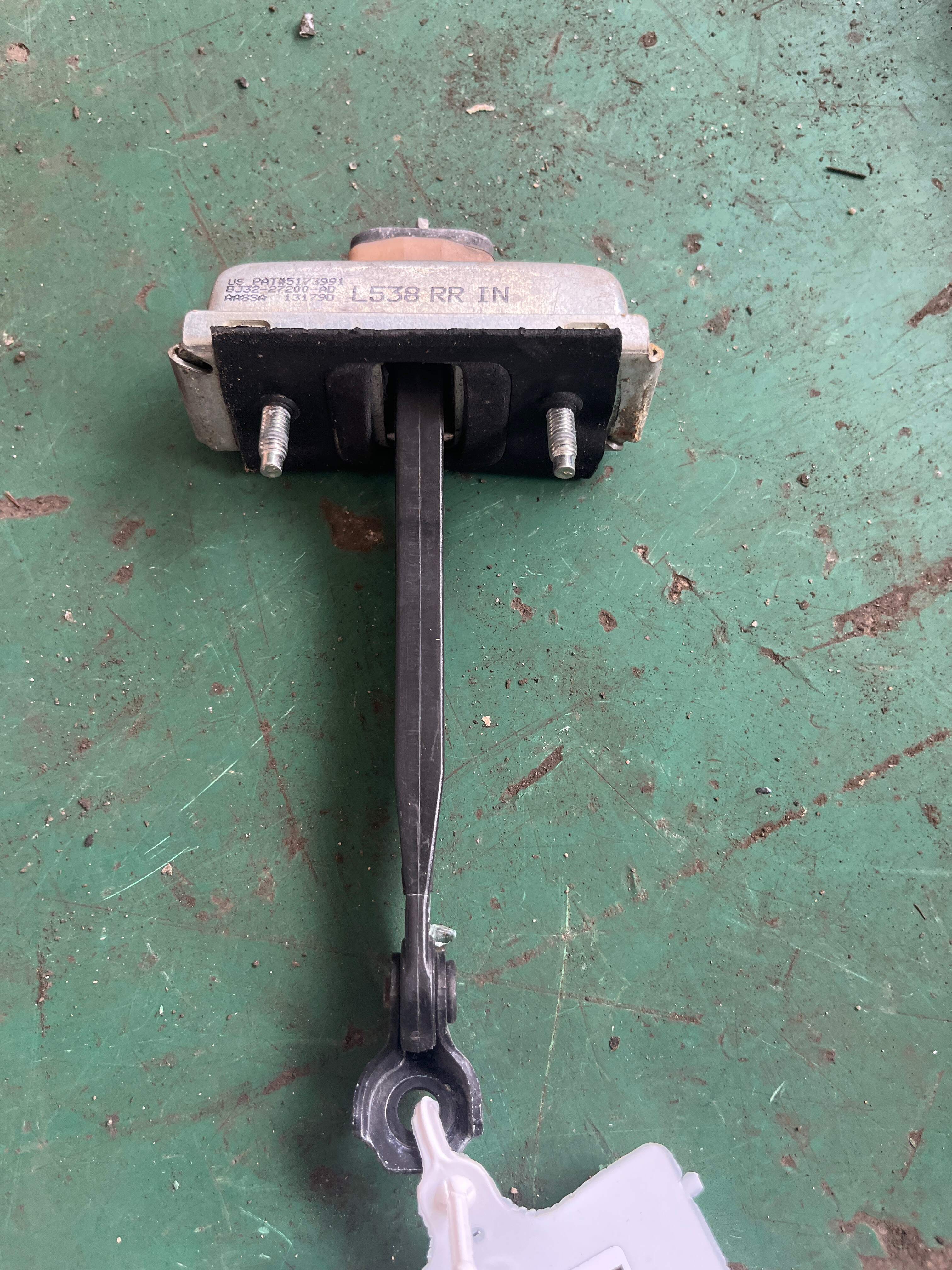 LR027611 Rear Door Check Strap, Left