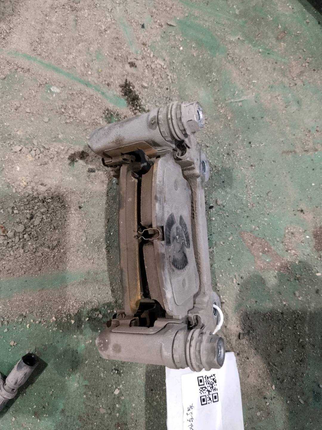 L8W0615426 Rear Brake Caliper Bracket, Right