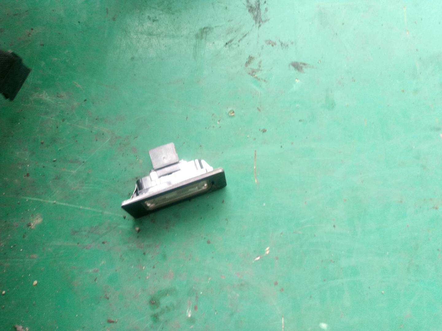 L8KD943021 Rear License Plate Light, Left