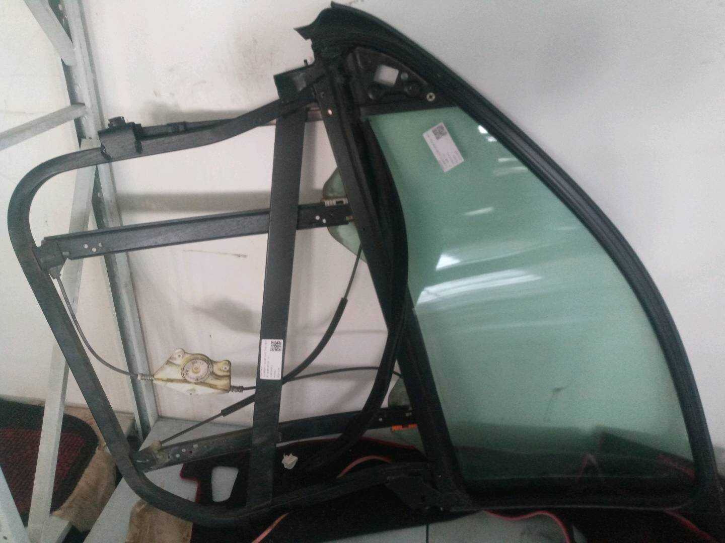 7L0837462F Front Door Window Regulator Bracket, Right