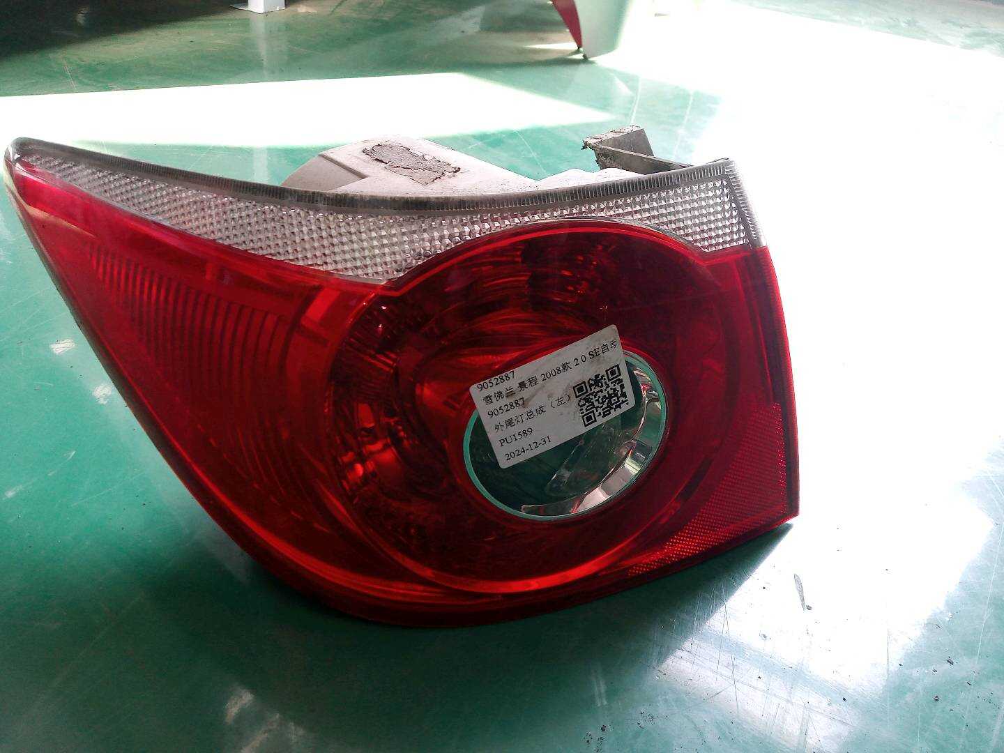 9052887 Outer Tail Light Assembly, Left