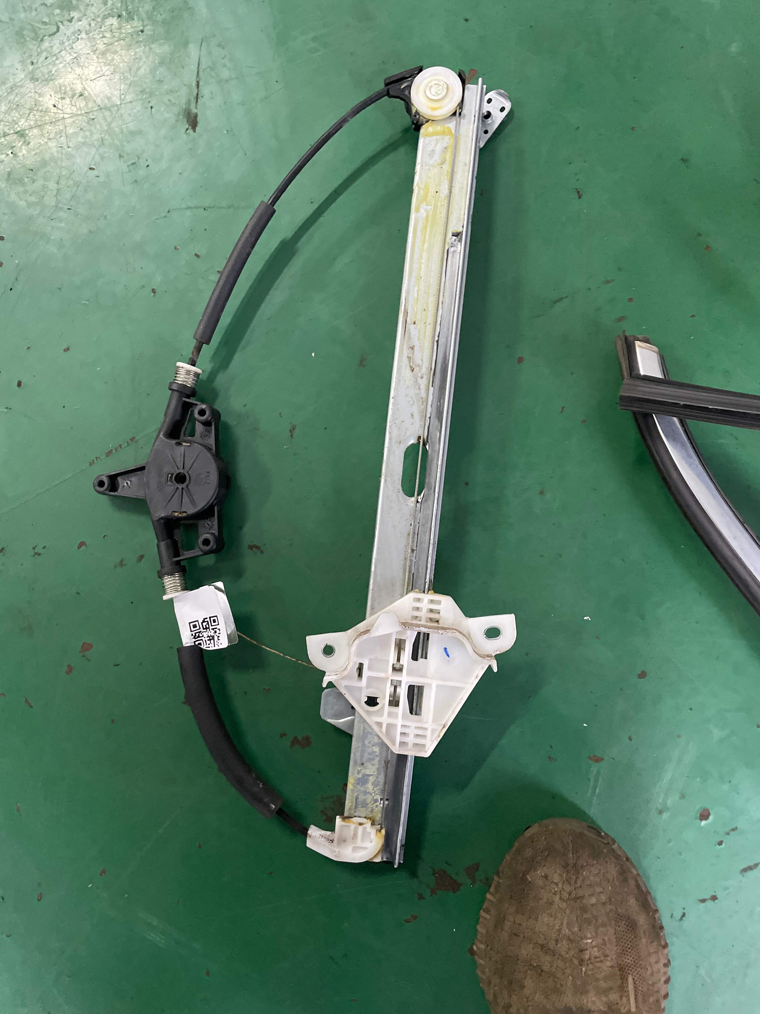 BKC359590 Front Door Window Regulator Bracket, Left