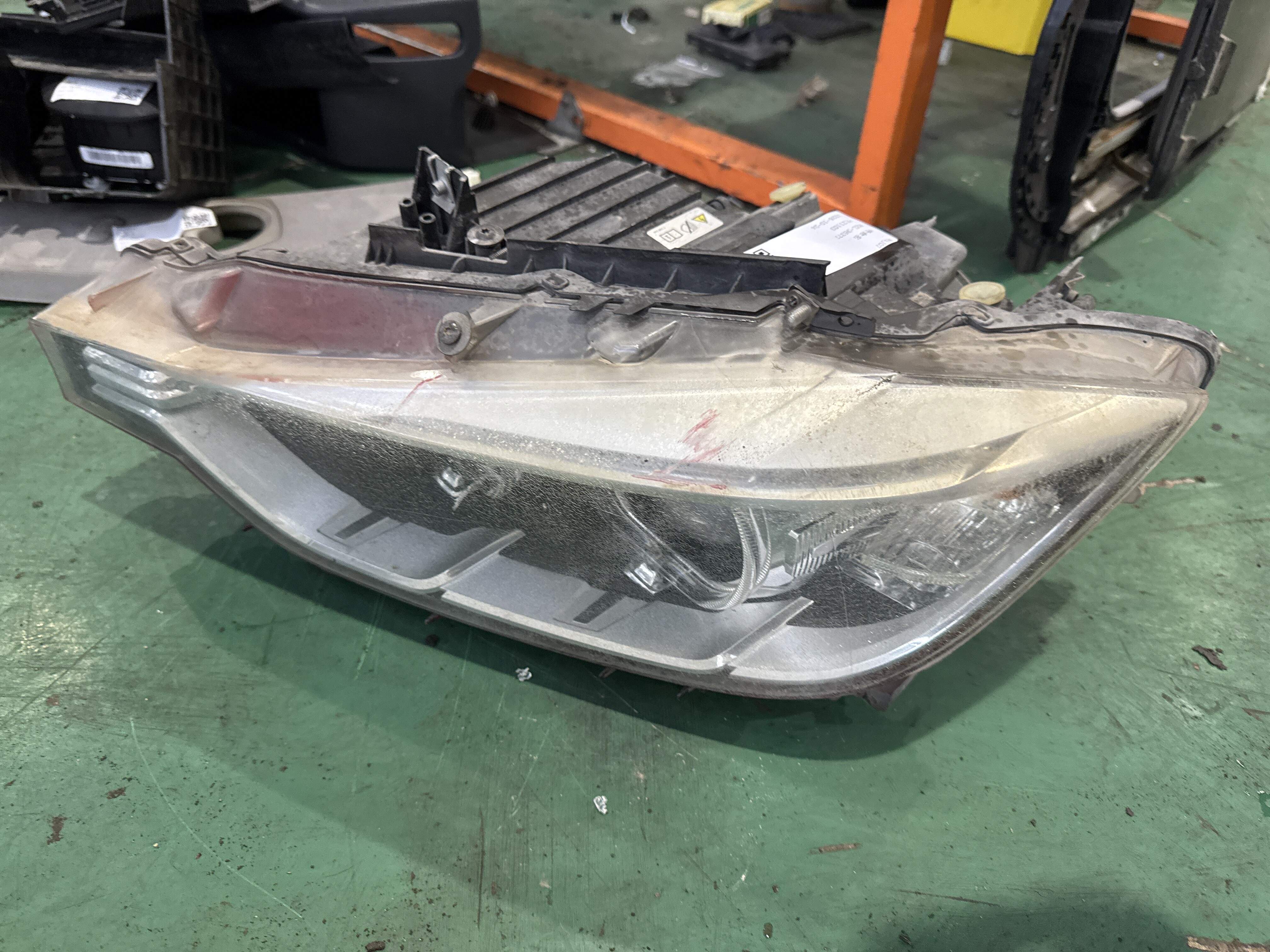 63117339389 Front Headlight Half Assembly, Left