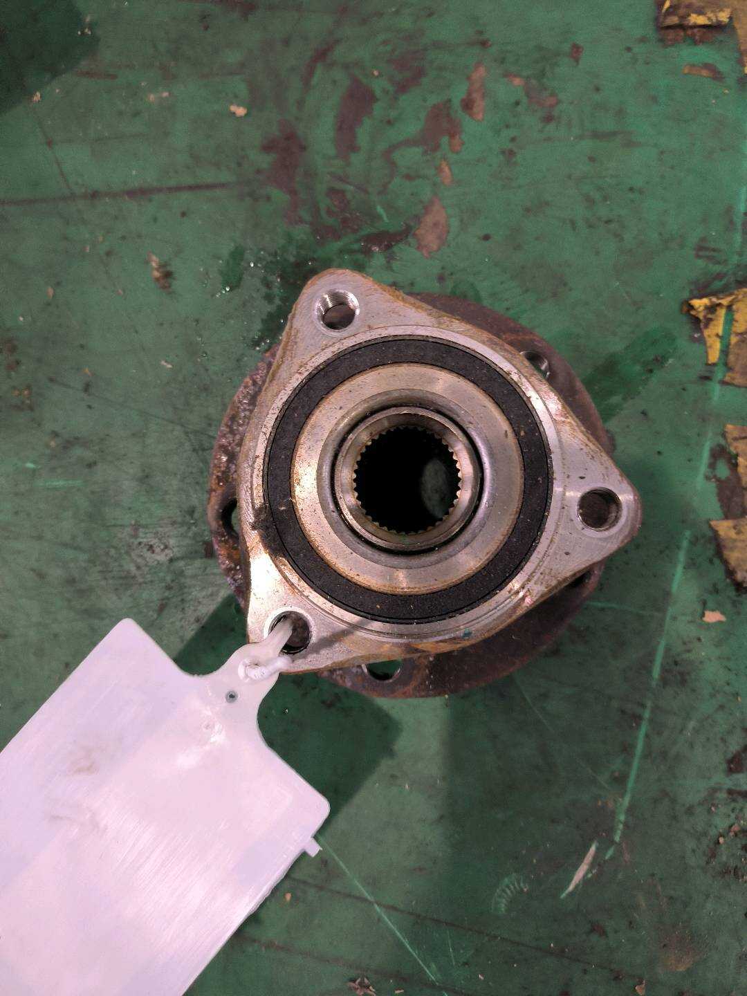 L5QL407621 Front Wheel Hub With Bearing, Left