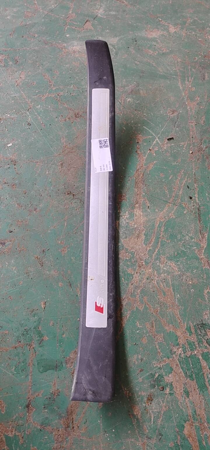 8E0853374R Front Door Sill Trim Panel, Right