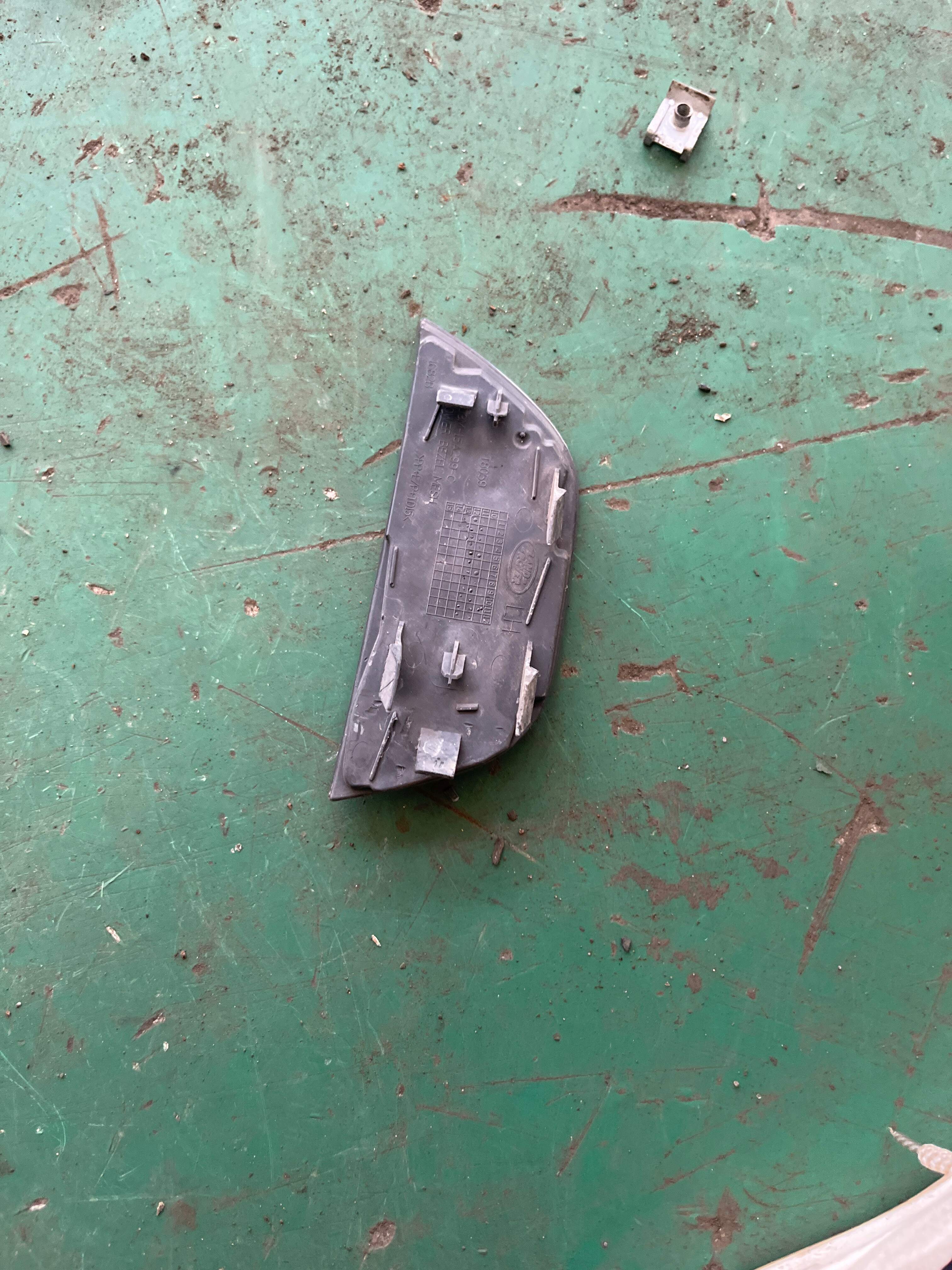 LR027867 Front Fog Light Bezel (Left Lower)