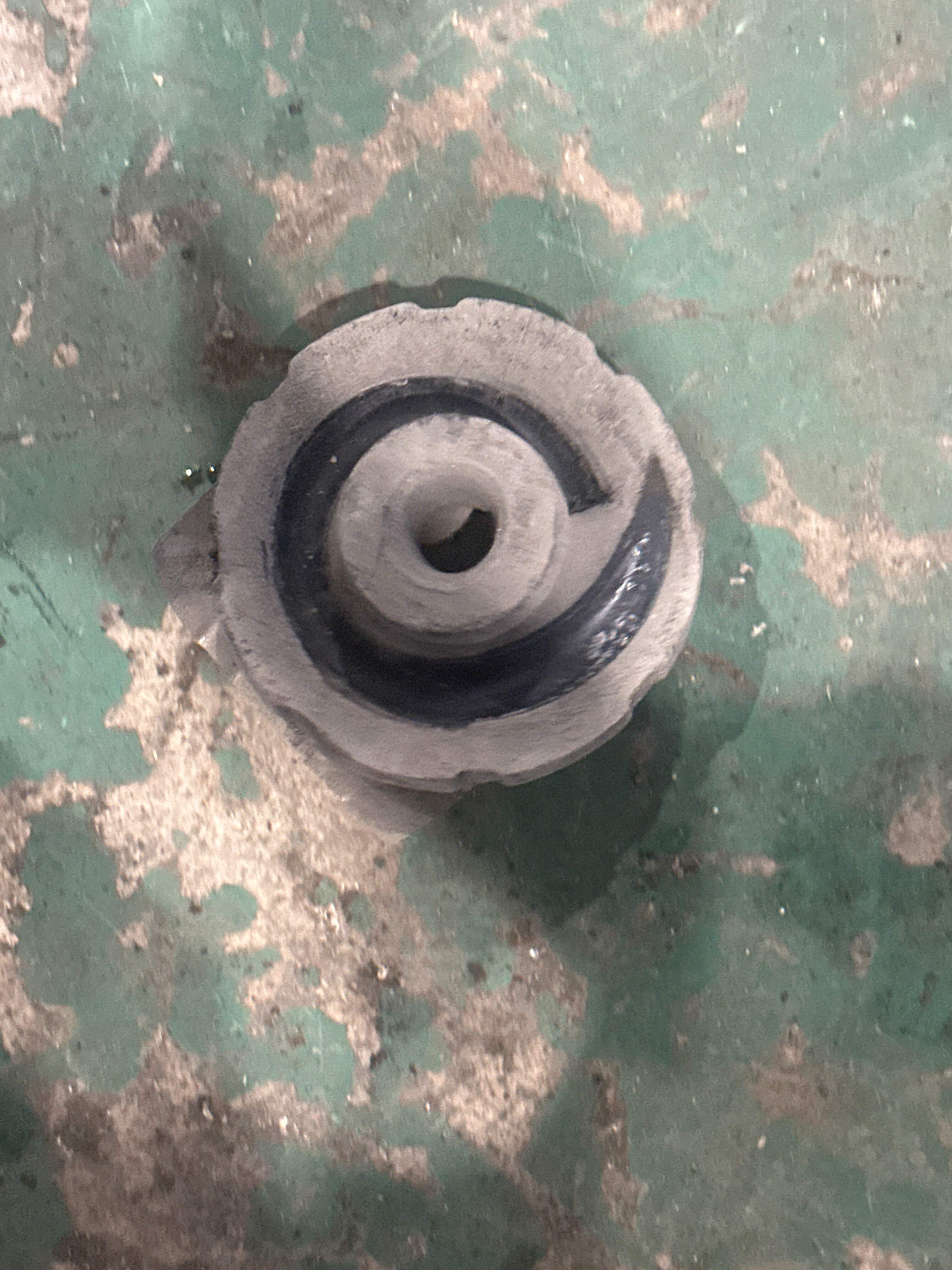 L8E0512149P Rear Shock Absorber Spring Pad (Upper Left)