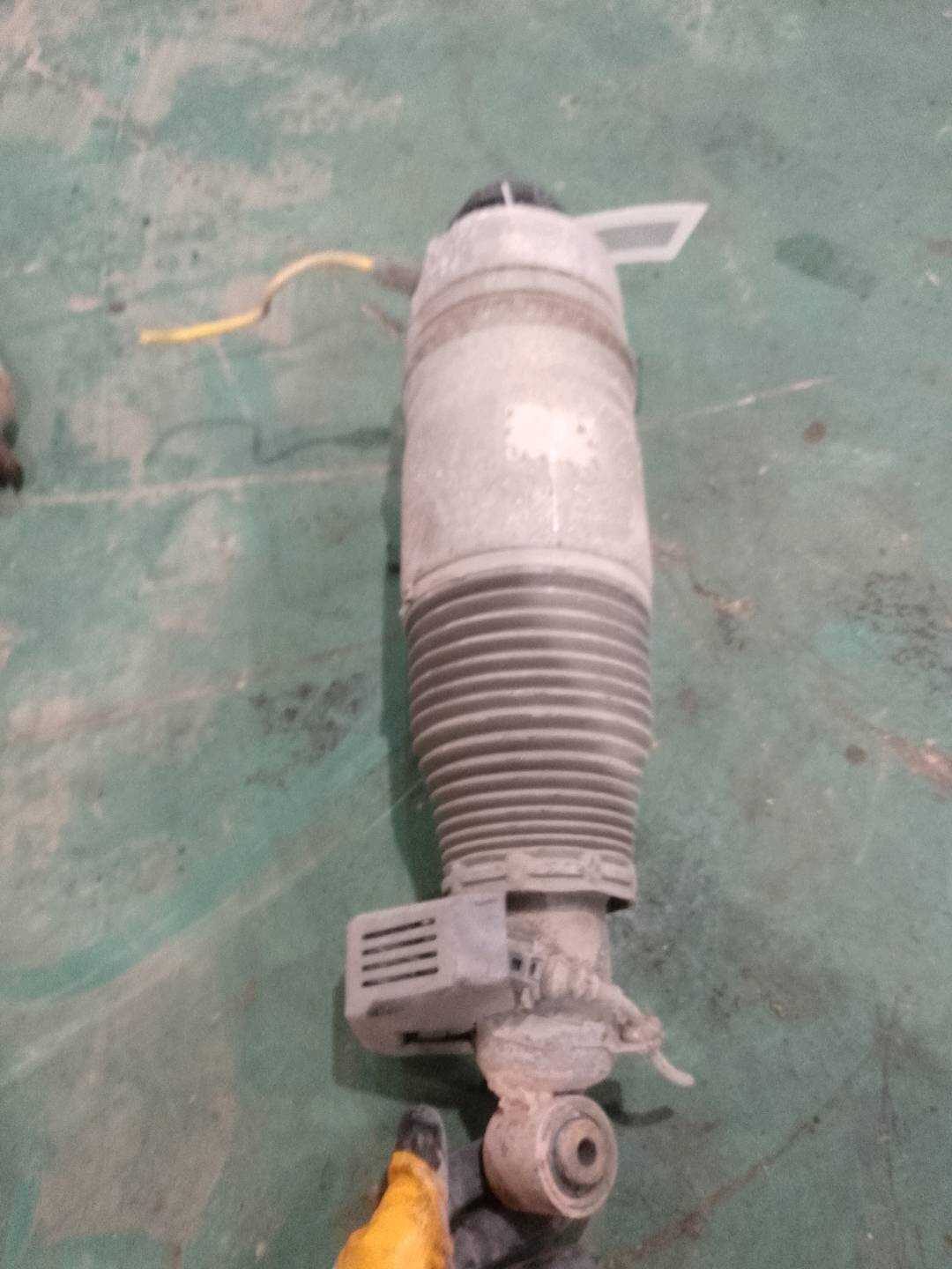 7L8616020C Rear Shock Absorber Assembly, Right