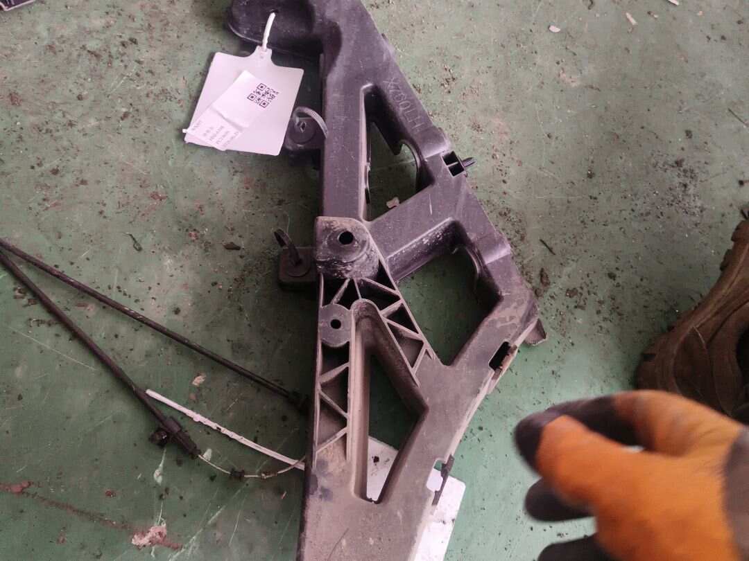 T4N13779 Rear Bumper Bracket, Left