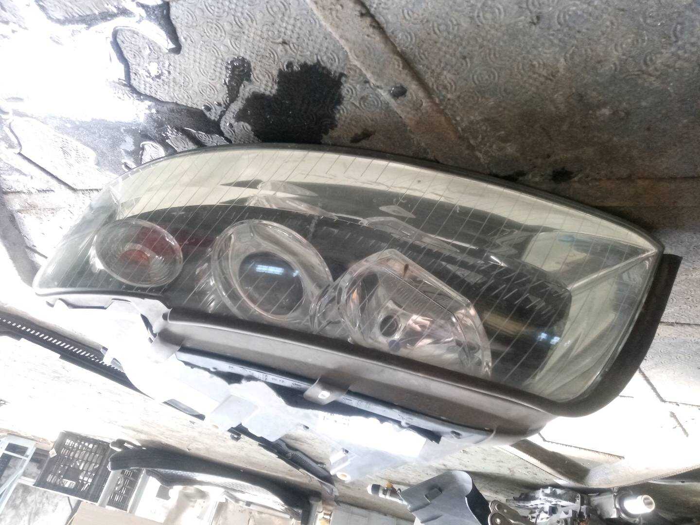 8E0941029C Front Headlight Half Assembly, Left