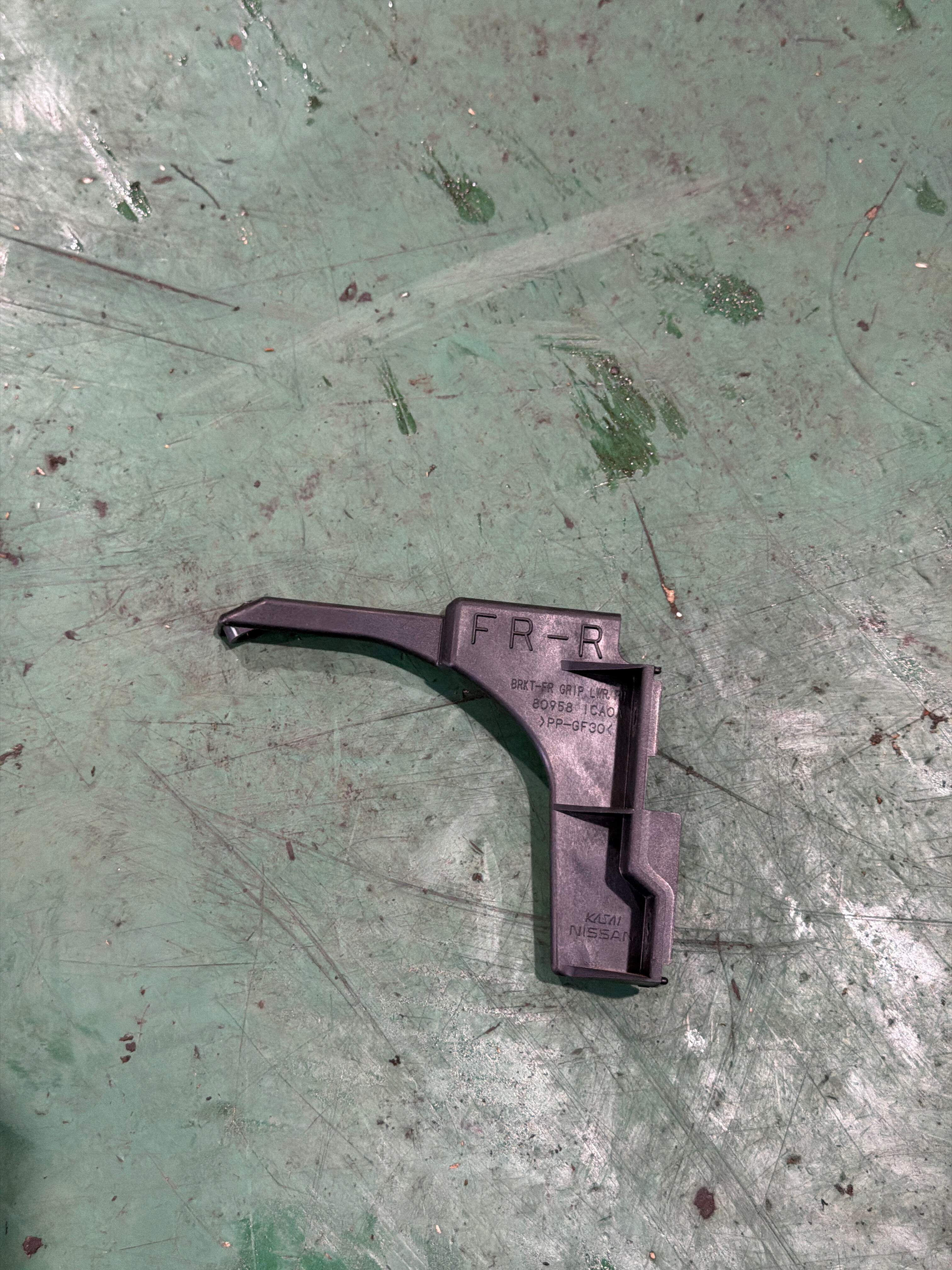 809581CA0A Front Door Armrest Bracket, Right