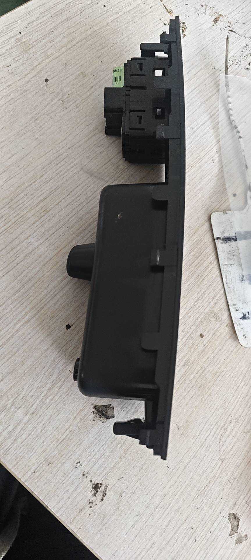 MEF3746070 Rear Left Window Switch Group and Trim Panel Assembly
