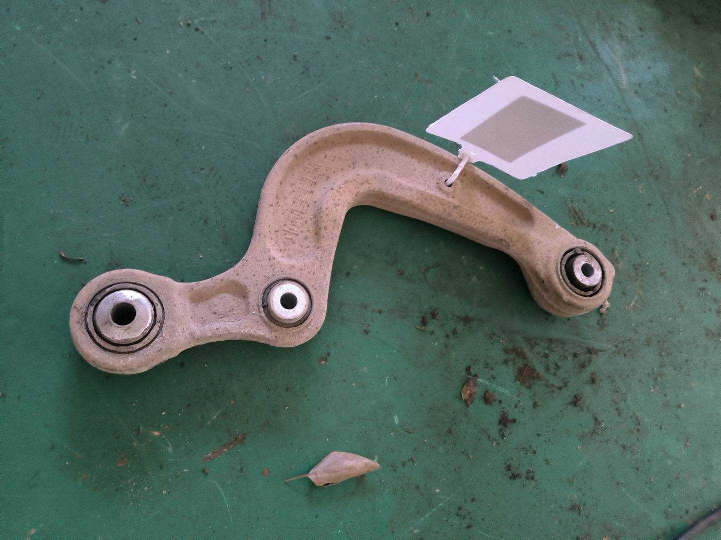 L8WD505324 Rear Upper Control Arm, Front Right
