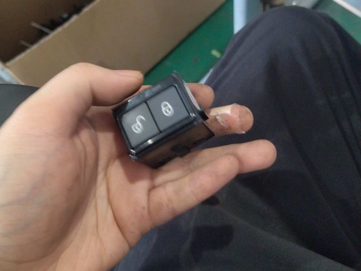 T2H4025 Front Door Lock Switch, Left
