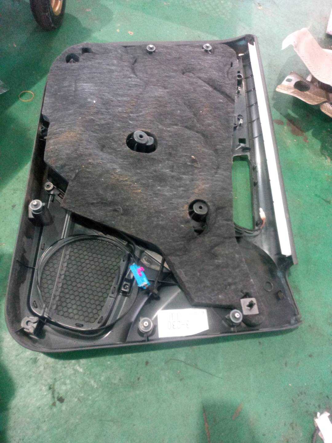 8T8867104F Front Door Trim Panel, Right