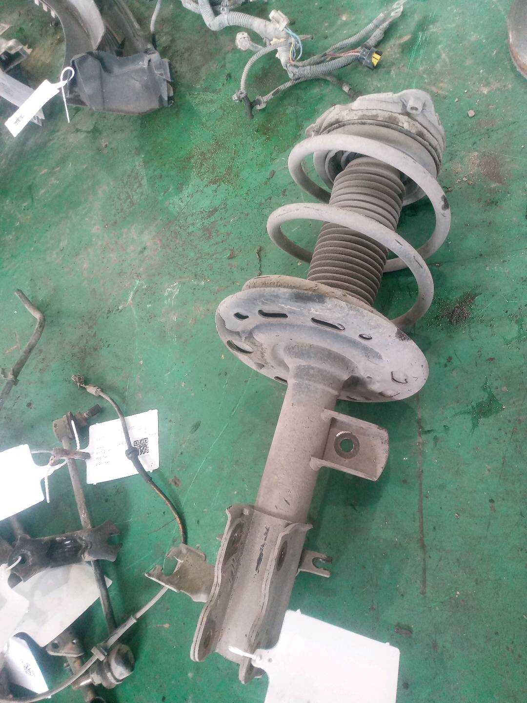 54303JC00C Front Shock Absorber Assembly, Left