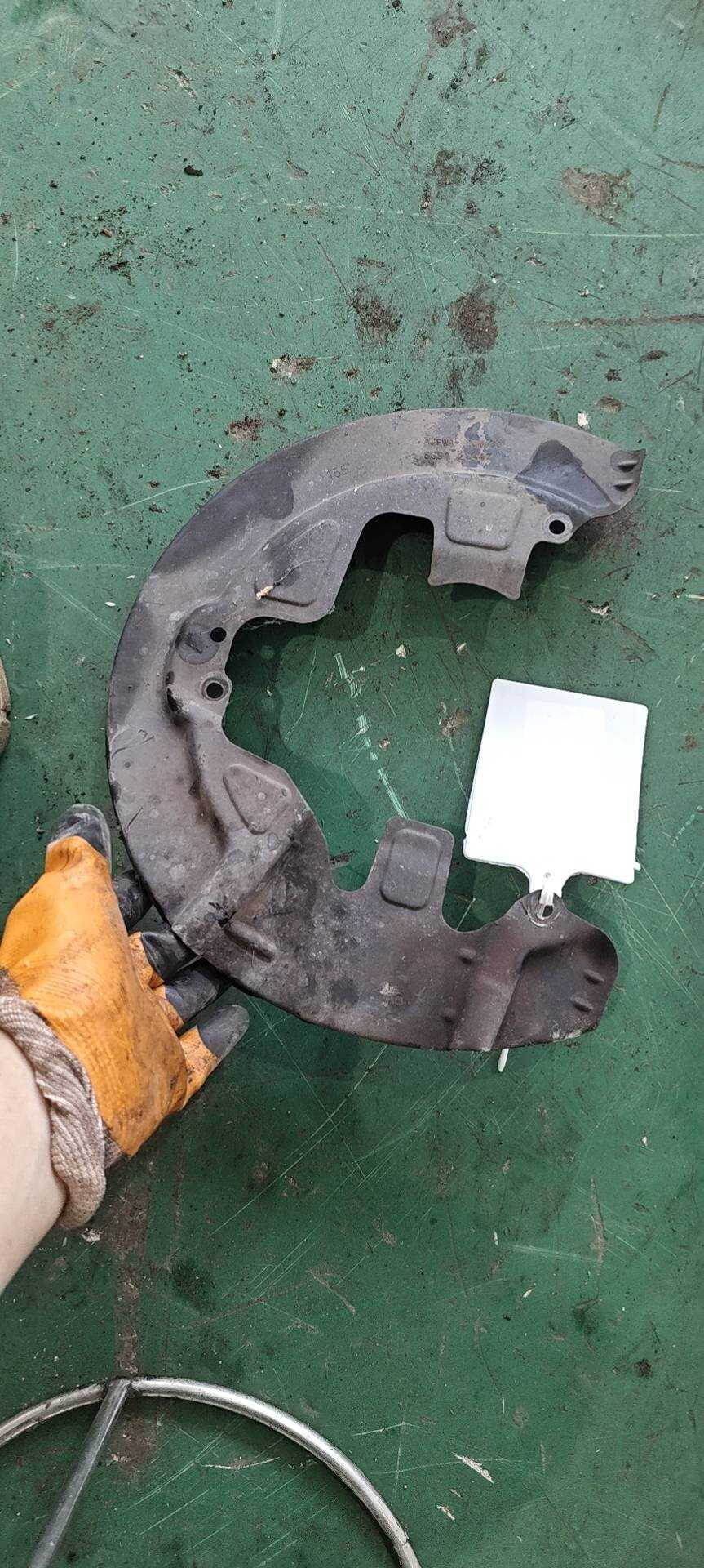 LR041426 Front Brake Dust Shield, Left