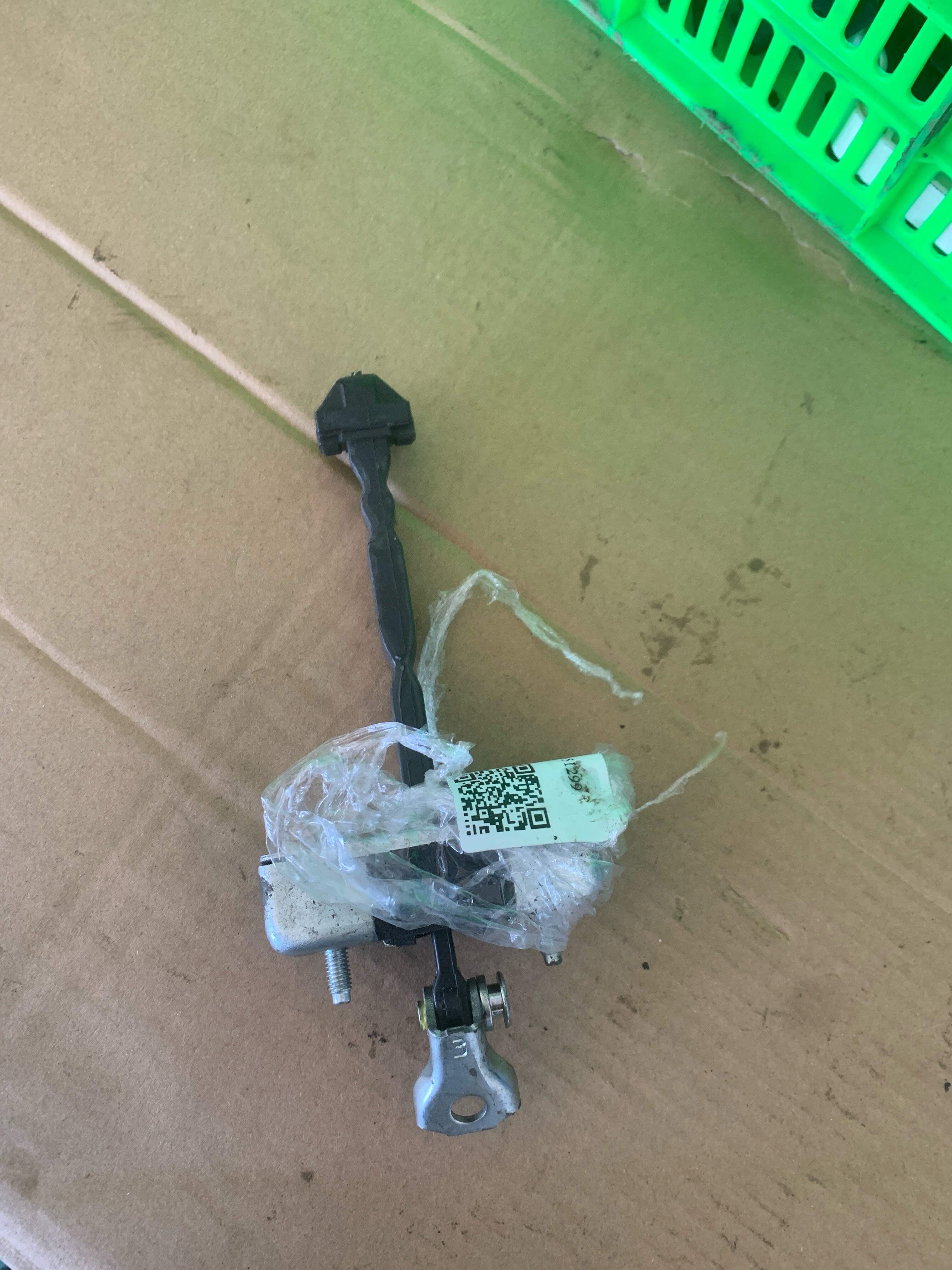 686400N021 Rear Door Check Strap, Left