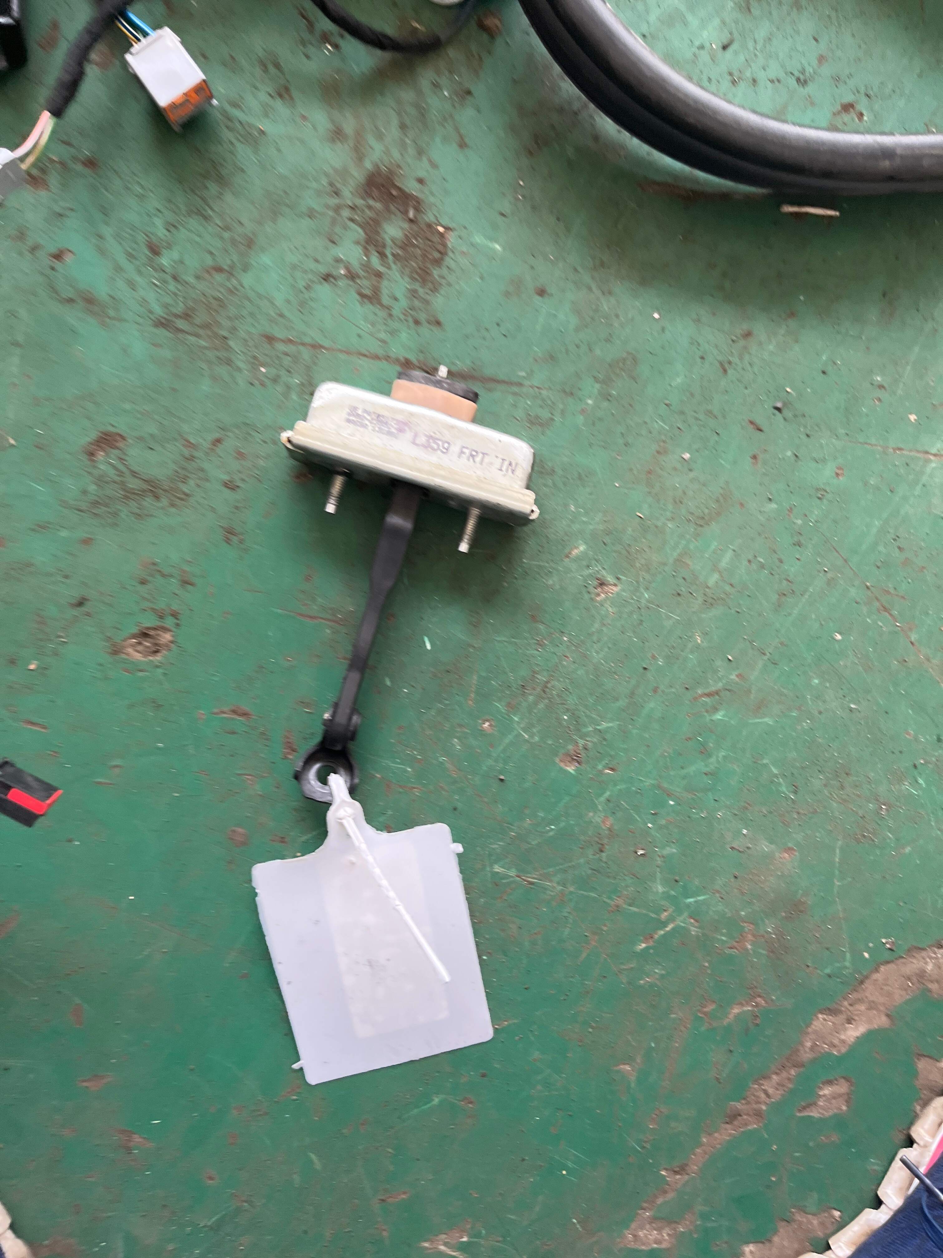 LR042356 Front Door Check Strap, Left