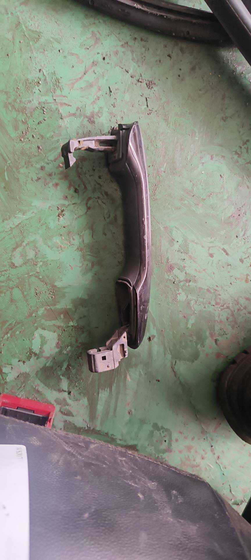 BT4Z7822404BAPTM Front Door Outer Handle, Left