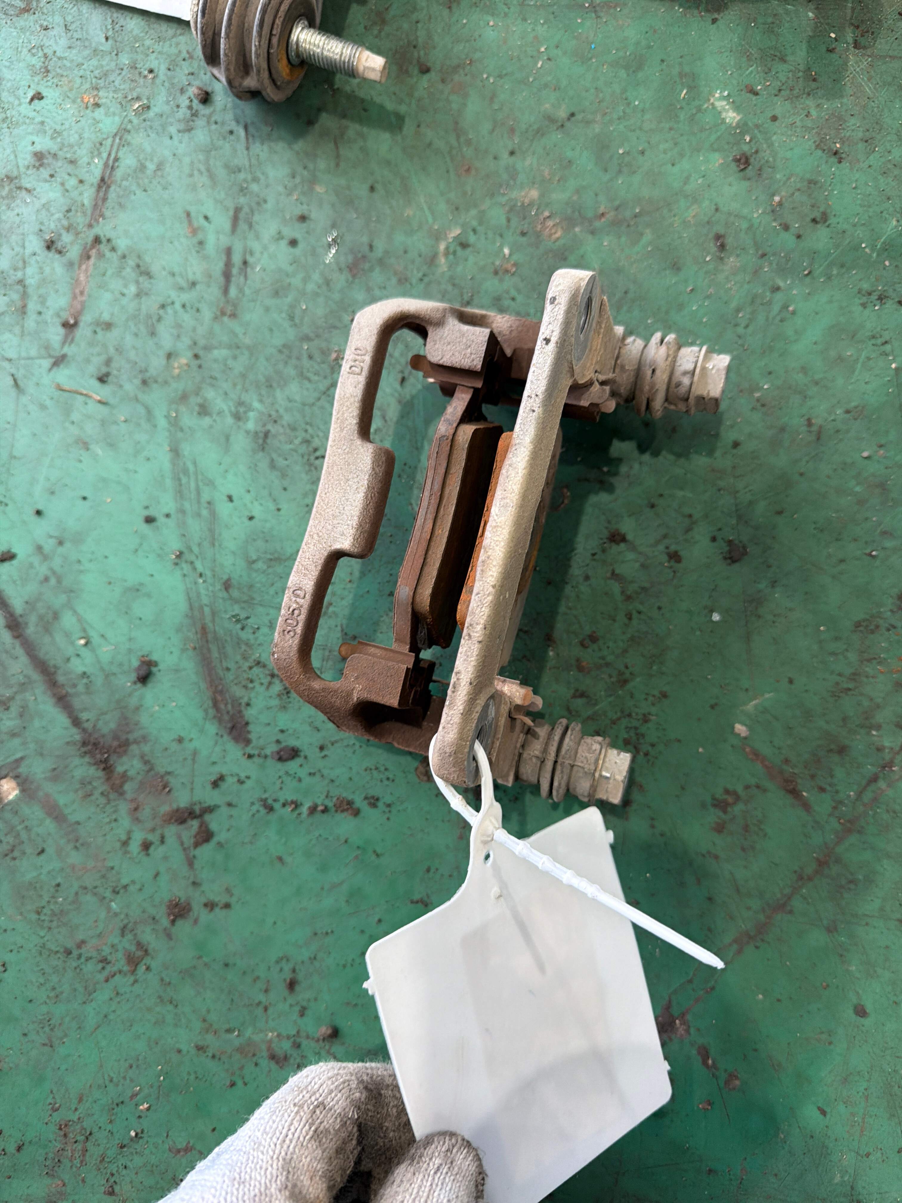A1694201415 Rear Brake Caliper Bracket, Left