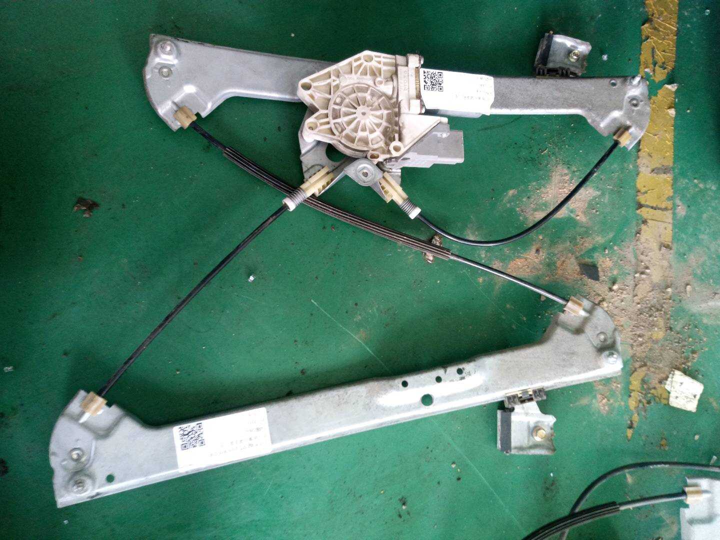 5488038 Front Door Window Regulator Bracket, Left