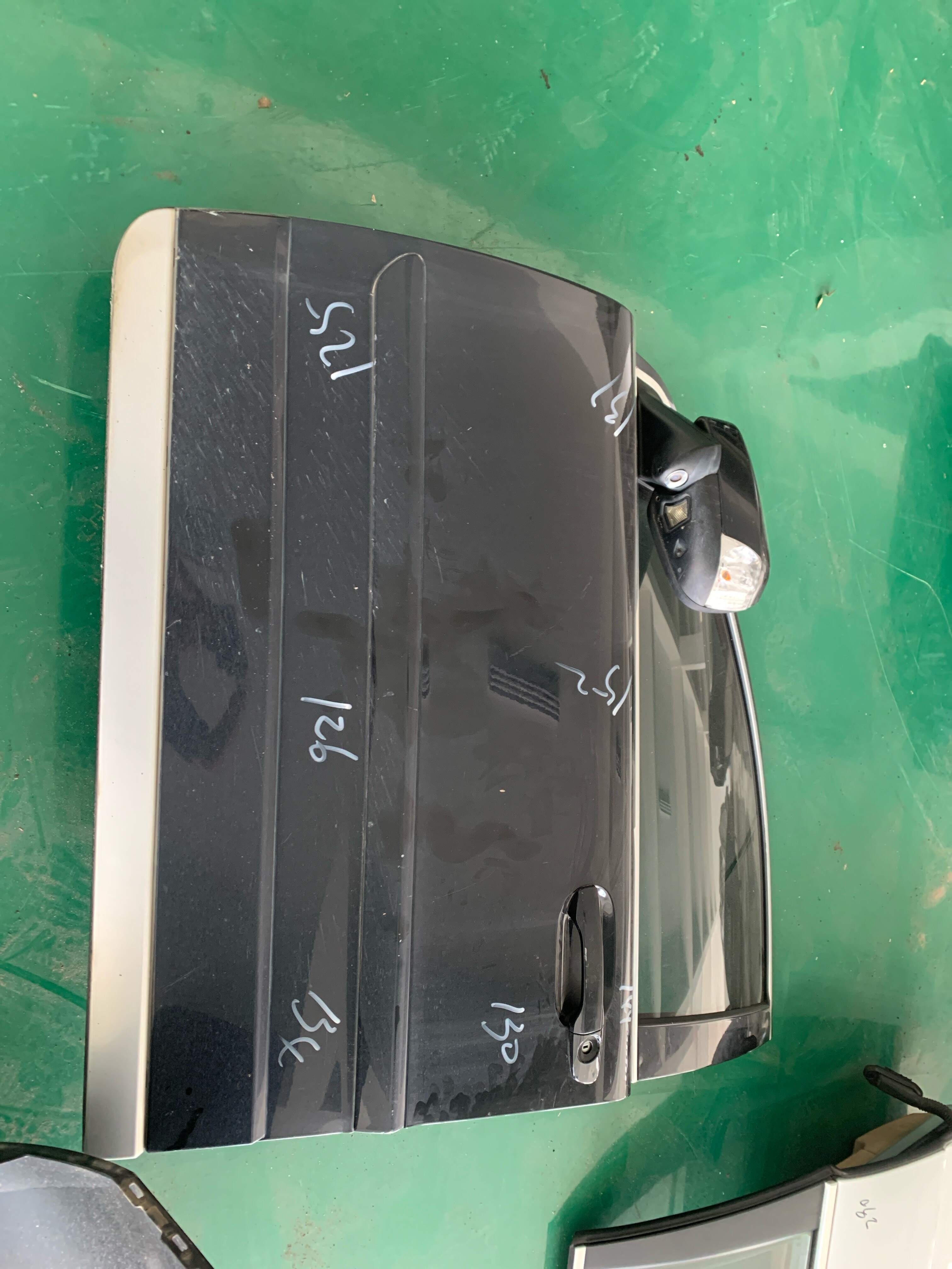 31385356 Front Door Shell, Left