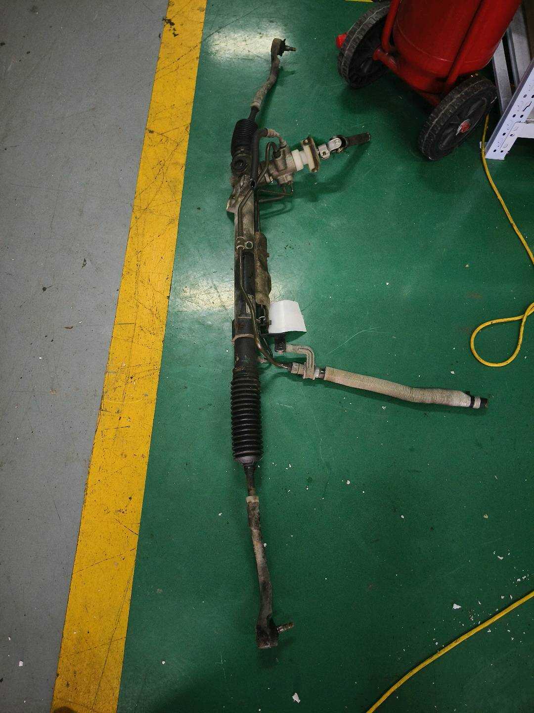 577004Q001 Steering Rack