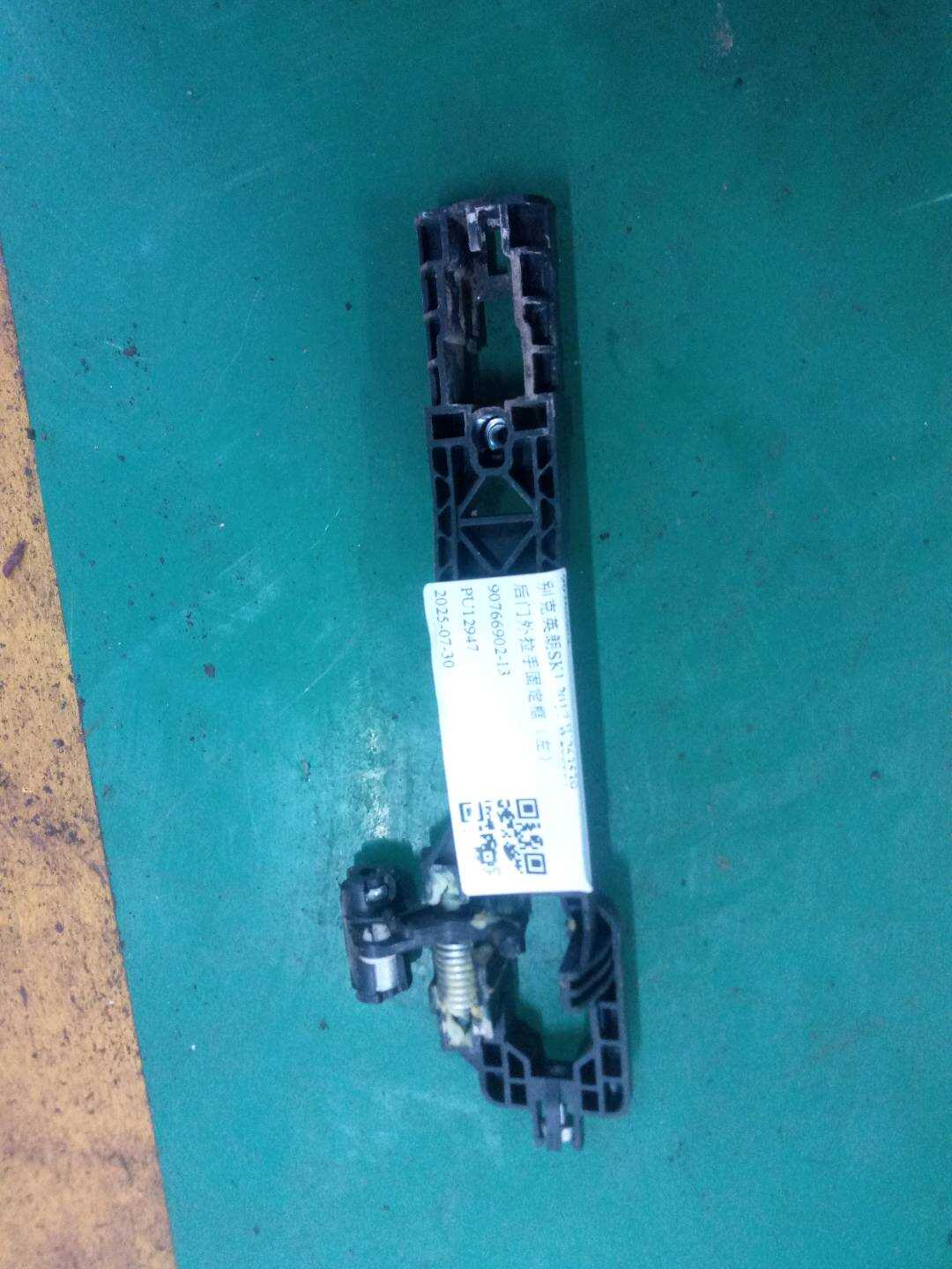 90766902 Rear Door Outer Handle Mounting Frame, Left