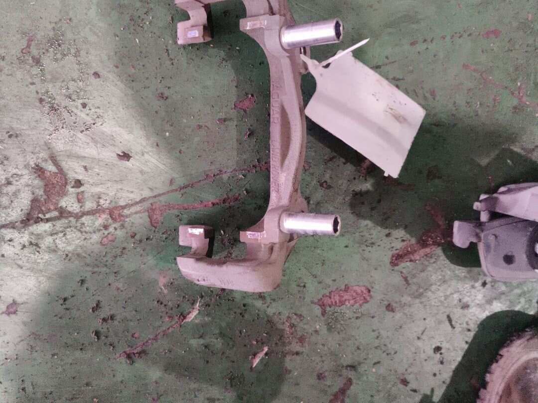 C2C41872 Front Brake Caliper Bracket, Left