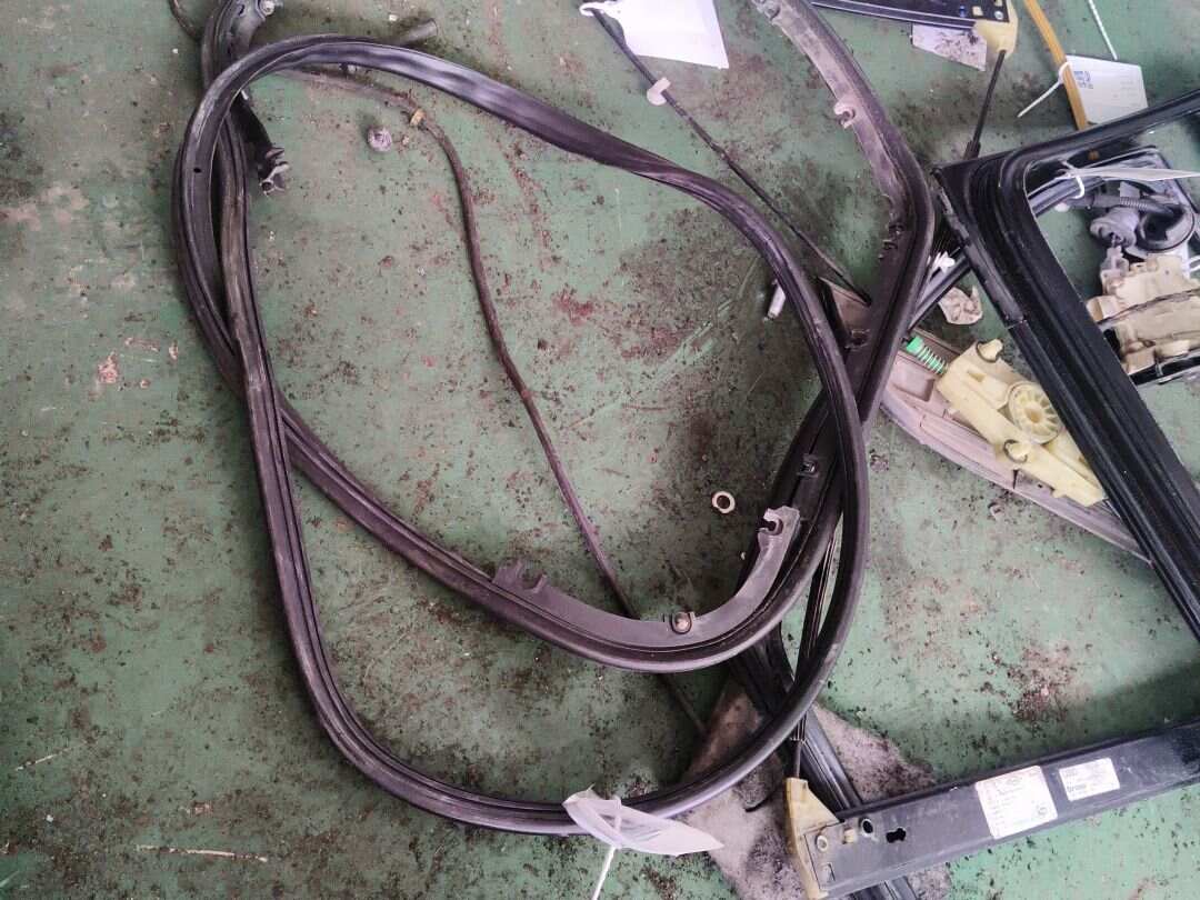 L4FD839911 Rear Door Seal Strip, Left