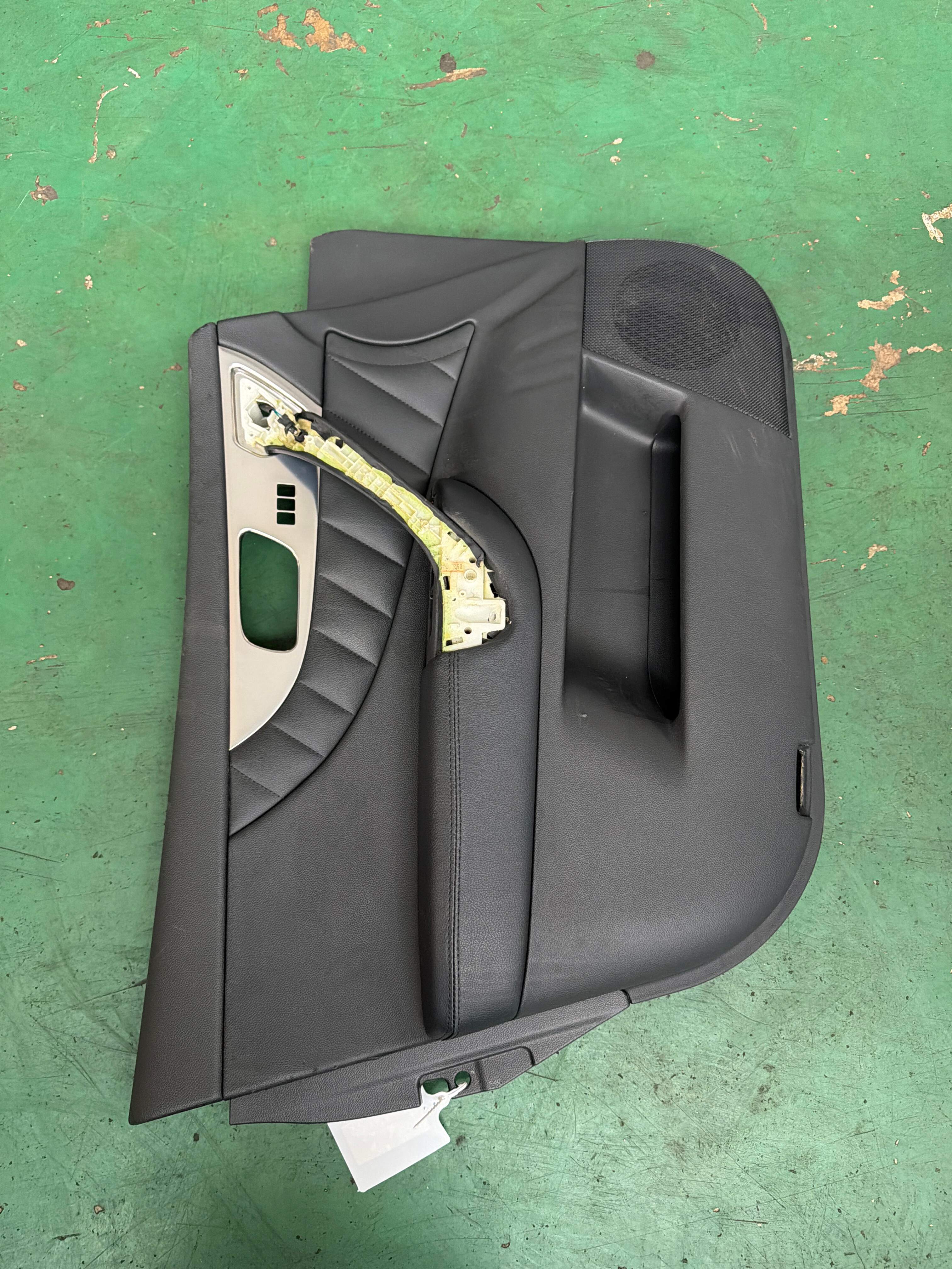 809011CJ0B Front Door Trim Panel, Left