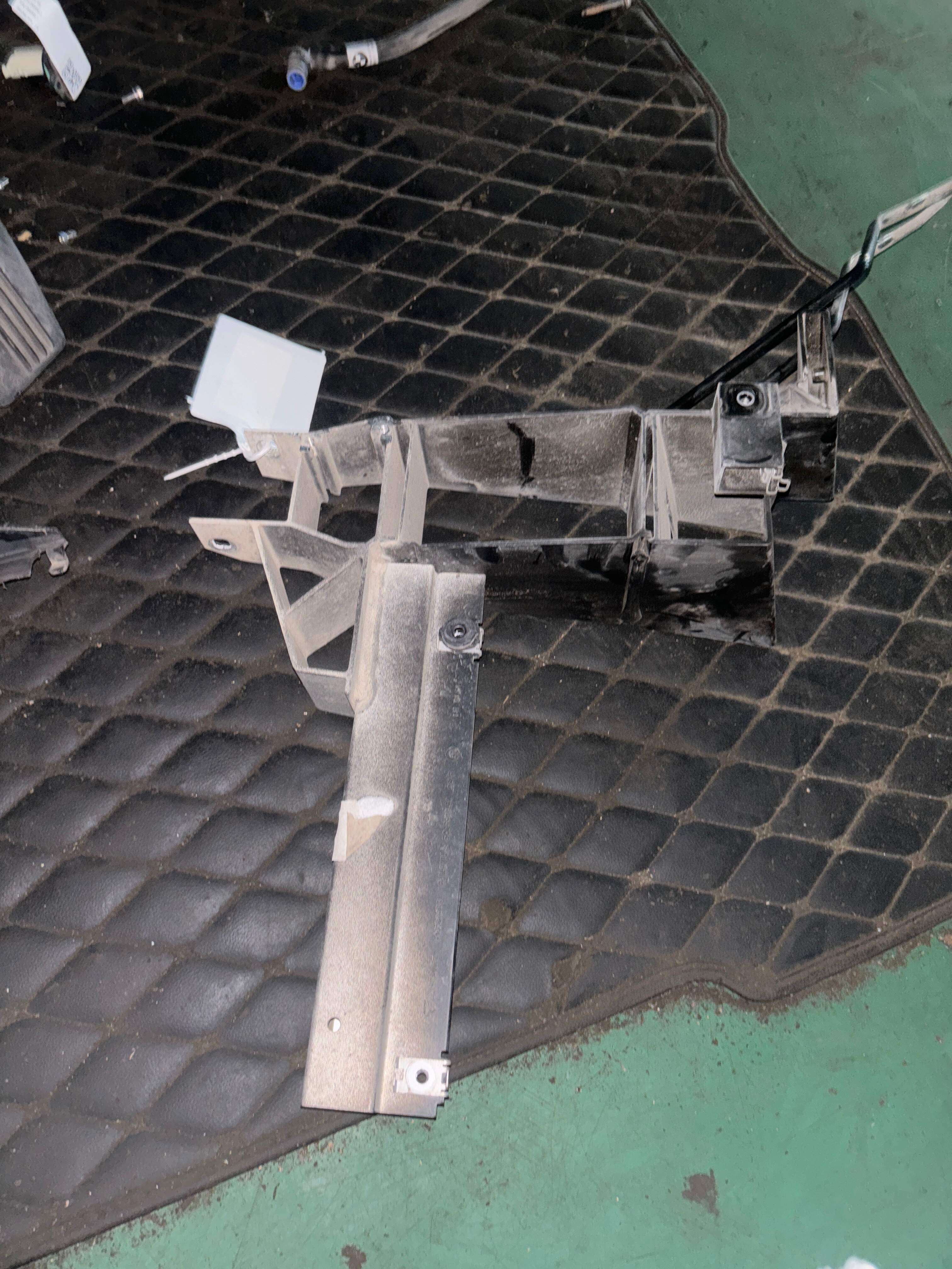 51647210499 Headlight Steel Mounting Bracket, Left
